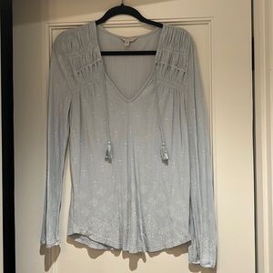Lucky Brand, light blue and white long sleeve shirt with tassels. Size Medium